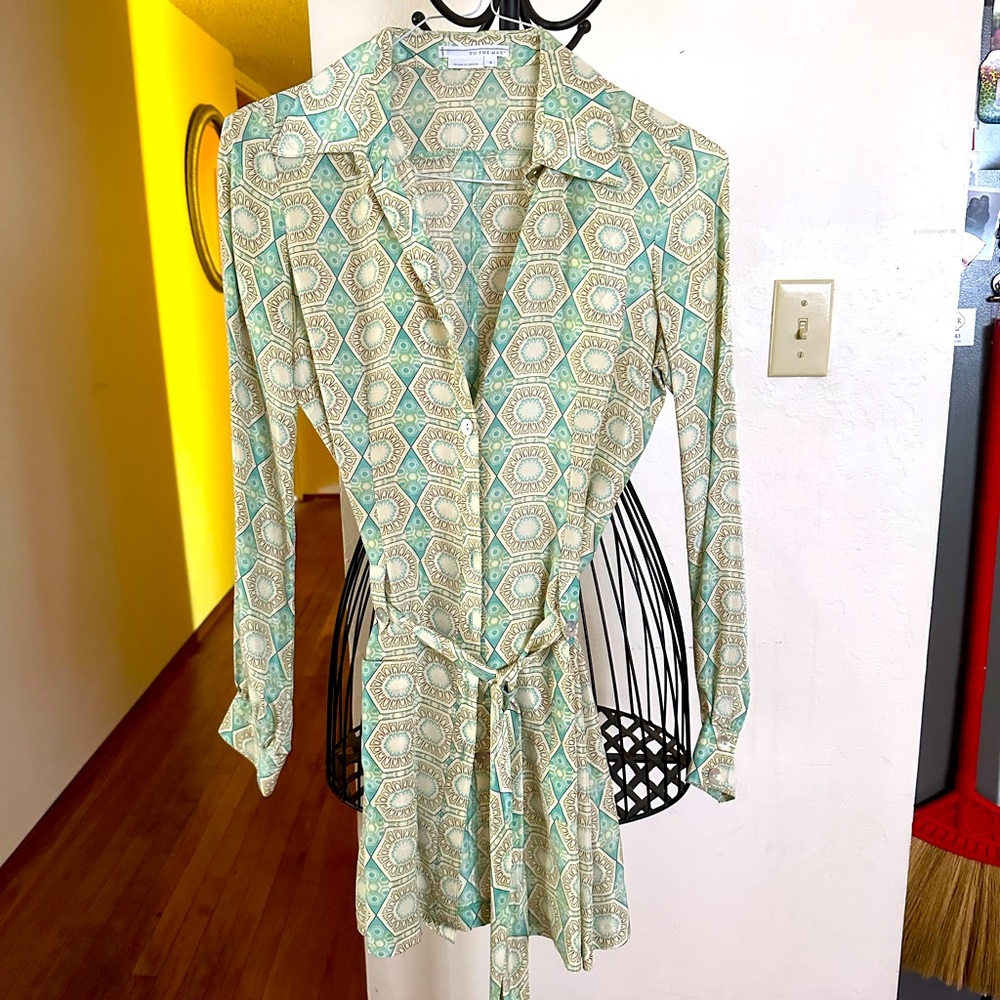 Beautiful 100% silk can be worn as a dress or a blouse.